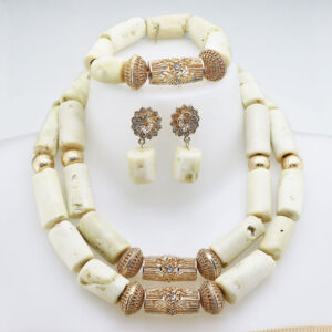 Which Look Gets Your Vote, White Ivory Beads or the Coral Beads?